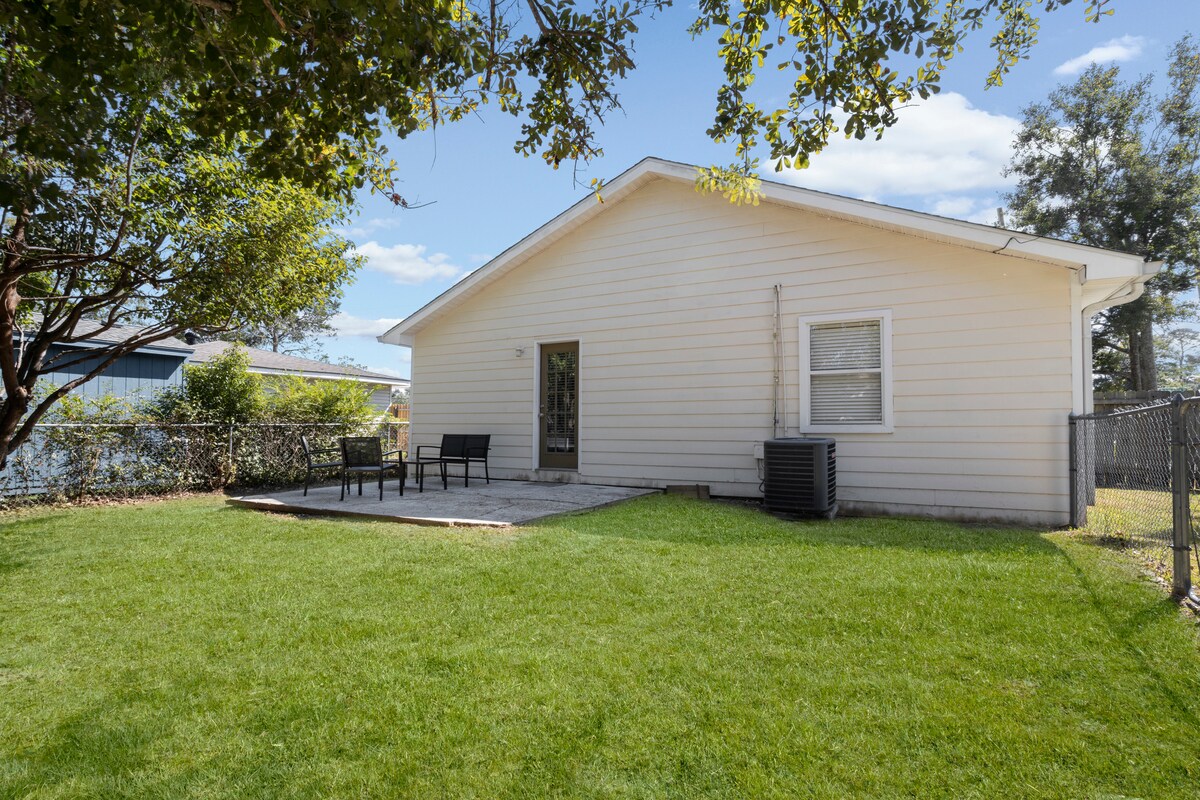 Spacious patio and backyard